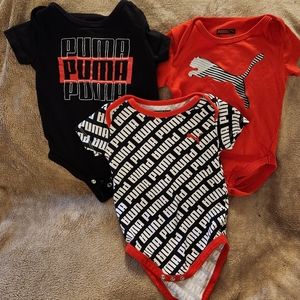 Three PUMA size 6 to 9 month onesies. New!